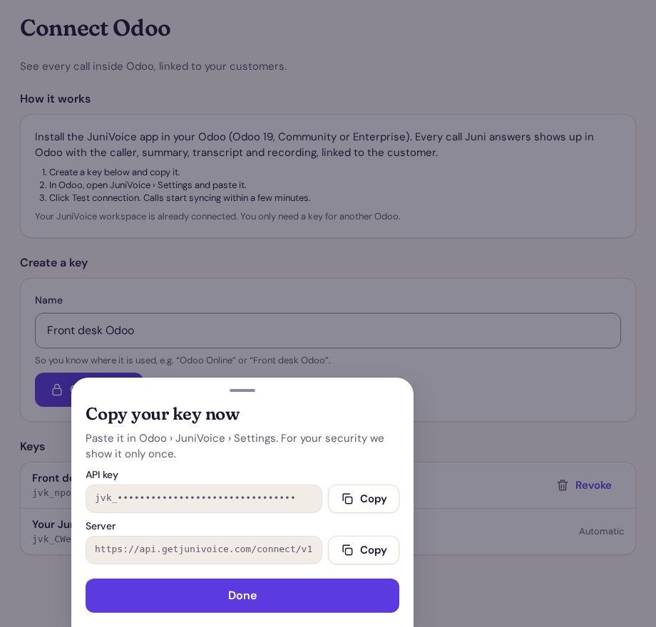 La pantalla Connect Odoo de la app de JuniVoice con una clave nueva lista para copiar, datos de ejemplo